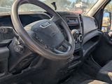 a picture of the interior of a truck with the driver ' s seat up