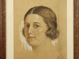 portrait of a woman in a brown frame with a brown background