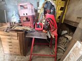 an image of a workbench with a lot of tools on it