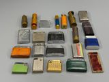 many different types of lighters and lighters laid out on a table