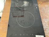 an image of a stove top with a black burner on it