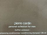 the label of a bottle of perfume on a brown background