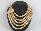 a close up of a necklace on a mannequin mannequin