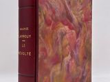 an old book with a red cover and a painting on the cover