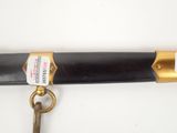 an image of a pair of scissors hanging from a handle