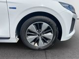 a close up of a car ' s tire on the pavement