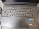 a laptop computer sitting on a table with a mouse
