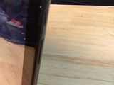 a close up of a cell phone on a table