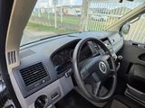 a car dashboard with a steering wheel and a dash board