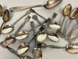 a lot of spoons and spoon spoons on the table