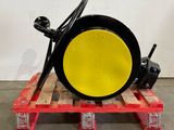 a close up of a fork lifter on a pallet in a warehouse
