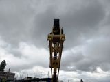 a crane that is sitting in the middle of a construction site