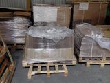 boxes and pallets are stacked on pallets in a warehouse