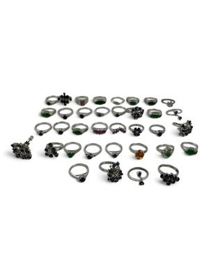 an image of a bunch of rings and rings on a white surface