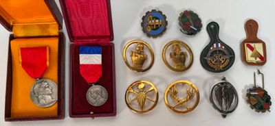 many medals and medals in a case on the table