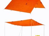 an image of two orange tarps with the letters x and x on them