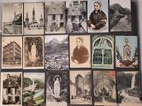 a lot of old photos on the wall of a church