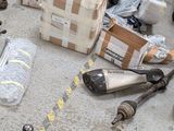 a lot of assorted items sitting on the floor