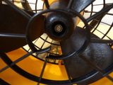 a close up view of a fan that is on a table