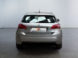 a silver car that is parked in a room