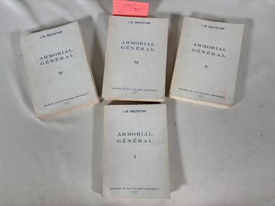 trois livres sont empilés sur une table