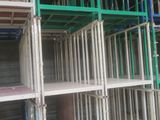 many shelves that are on the side of a building