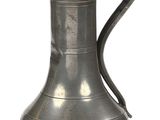 a silver vase with a handle on a white background