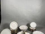 a lot of plates that are sitting on a table