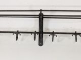 a picture of a rack with a bunch of hooks on it