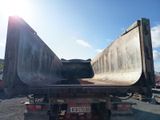 an image of a truck with a large load on it ' s back