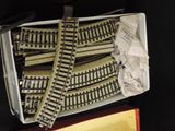 a box with a bunch of train tracks inside of it