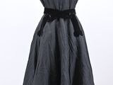 an image of a woman ' s dress on a mannequin stand
