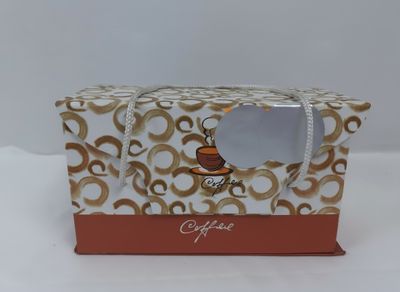 une boîte marron et blanche ornée d'un motif marron et blanc