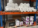 many rolls of toilet paper on the shelves in the store