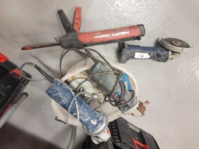 a lot of tools that are sitting on the floor