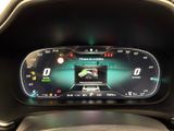 the dashboard of a car with a digital display on it