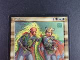 the card has a picture of two men with capes on them