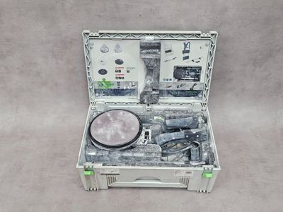 a tool case with tools inside of it on the floor