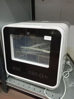 a microwave oven sitting on top of a table