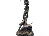 an image of a metal candle holder with a deer on it