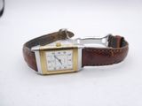an image of a wrist watch with a brown leather band