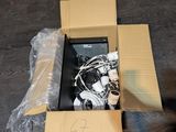 a cardboard box with a bunch of electronics inside of it