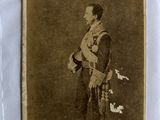 an old photo of a man in a military uniform