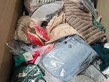 a box full of clothes and other items that are in it