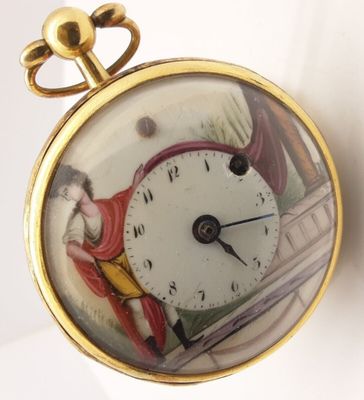 une horloge sur laquelle figurent les portraits d'un homme et d'une femme