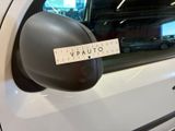 a sticker on the side mirror of a white car