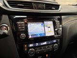 the dashboard of a car with a gps device in it