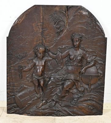 une image représentant une sculpture d'un homme et d'une femme dans un paysage