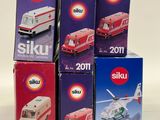six boxed boxes of various types of toy vehicles on a white surface