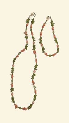 Parure comprenant un collier et un bracelet composés de perl…